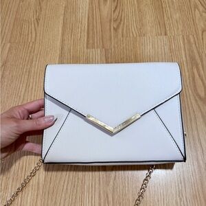 Chic Ivory Clutch with Gold Accent